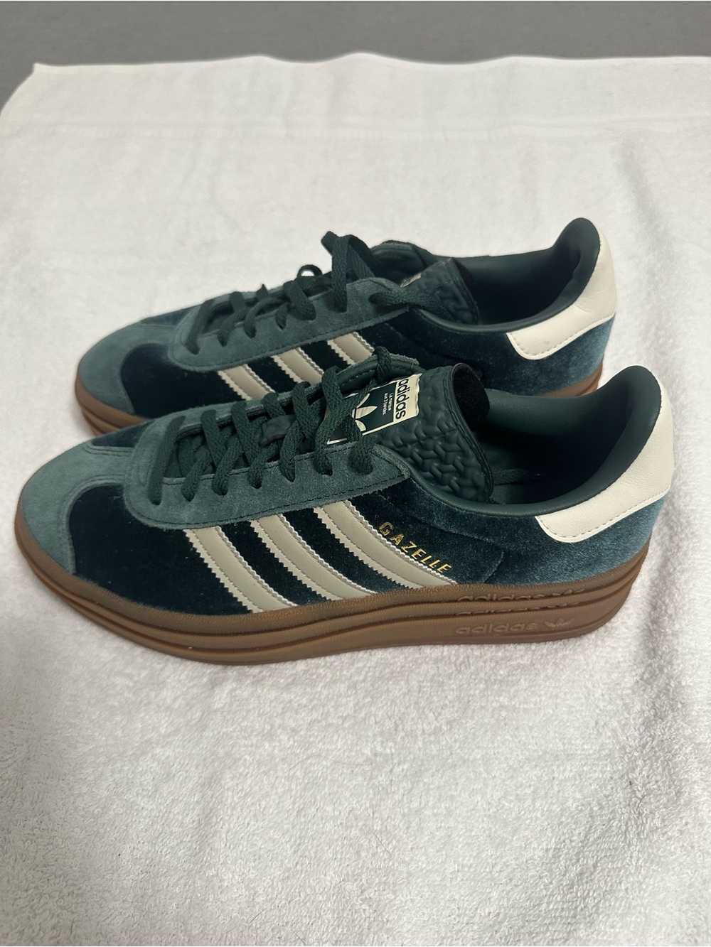 Adidas Gazelle sneakers in green with three beige stripes